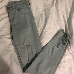 American Eagle Light Green Ripped Jegging